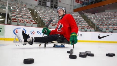 Ryan Straschnitzki takes to the ice to practice his sledge hockey skills in Calgary on Tuesday, August 7, 2018. Straschnitzki was injured in the Humboldt Broncos bus crash. HKO Sask Bus Crash Straschnitzki 20180807