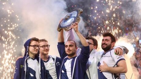 Members of Team Liquid celebrate with the Aegis trophy after winning the 2017 edition of The International and more than $10 million US in prize money. TI 2017 Winners