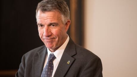 Vermont governor Phil Scott speaks to the press in his offices at the State Legislature in Montpelier, Vermont, U.S., March 13, 2018. USA-GUNS/STATES