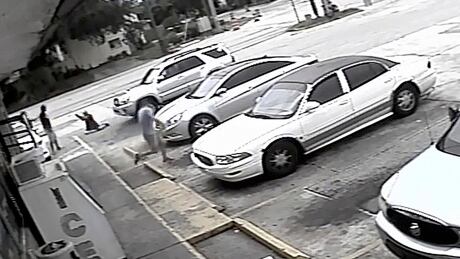 FILE - In this July 19, 2018 file frame from surveillance video released by the Pinellas County Sheriff's Office, Markeis McGlockton, far left, is shot by Michael Drejka during an altercation in the parking lot of a convenience store in Clearwater, Fla. Prosecutors charged a white man, Michael Drejka, with manslaughter Monday Aug. 13, 2018 in the death of an unarmed black man whose videotaped shooting in a store parking lot has revived debate over Florida’s “stand your ground” law. (Pinellas County Sheriff's Office via AP, File) Parking Dispute Shooting