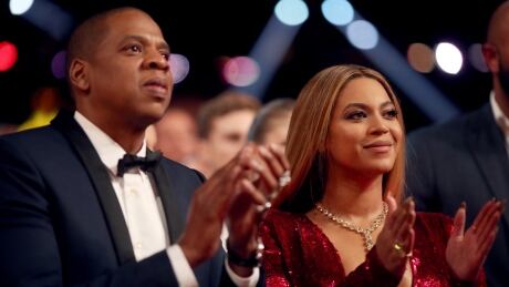 LOS ANGELES, CA - FEBRUARY 12: Jay Z (L) and Beyonce attend The 59th GRAMMY Awards at STAPLES Center on February 12, 2017 in Los Angeles, California. (Photo by Christopher Polk/Getty Images for NARAS) 700000165SH00006_The_59th_G