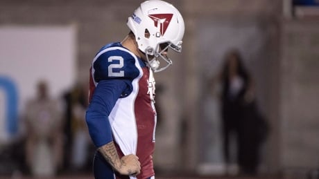 Montreal Alouettes quarterback Johnny Manziel pauses during third quarter CFL football action against the Hamilton Tiger-Cats in Montreal on Friday, August 3, 2018. Manziel's much-anticipated CFL debut fizzled quickly Friday night. The rookie quarterback threw an interception on his first down-field throw and finished with four overall in the Montreal Alouettes' lopsided 50-11 home loss to the Hamilton Tiger-Cats before 18,576 spectators at Molson Stadium. THE CANADIAN PRESS/Paul Chiasson manziel-johnny-20180803-1180