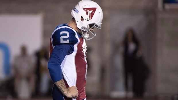 Montreal Alouettes quarterback Johnny Manziel pauses during third quarter CFL football action against the Hamilton Tiger-Cats in Montreal on Friday, August 3, 2018. Manziel's much-anticipated CFL debut fizzled quickly Friday night. The rookie quarterback threw an interception on his first down-field throw and finished with four overall in the Montreal Alouettes' lopsided 50-11 home loss to the Hamilton Tiger-Cats before 18,576 spectators at Molson Stadium. THE CANADIAN PRESS/Paul Chiasson manziel-johnny-20180803-1180