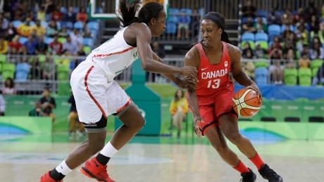Tamara Tatham, right, shown competing for Canada at the 2016 Olympics, has become the first Canadian woman on a men's pro basketball coaching staff. Rio Olympics Basketball Women