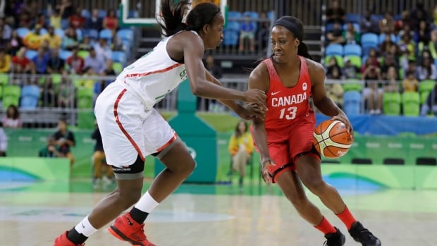 Tamara Tatham, right, shown competing for Canada at the 2016 Olympics, has become the first Canadian woman on a G League coaching staff. Rio Olympics Basketball Women