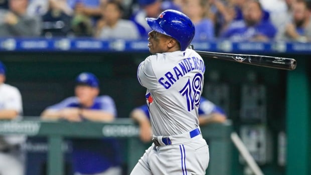 Curtis Granderson of the Blue Jays hits a grand slam in the fourth inning to help Toronto defeat the Kansas City Royals 6-5 on Wednesday.
Jays-Royals-15082018
