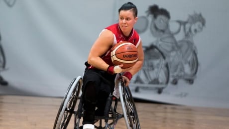 Cindy Ouellet, above, scored 14 points as Canada's wheelchair women's basketball team defeated Australia 82-74 in overtime on Sunday at the world championships in Germany. wheelchair-basketball