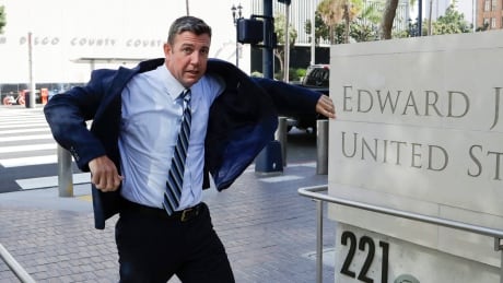 U.S. Rep. Duncan Hunter arrives for an arraignment hearing Thursday in San Diego. Hunter was considered a heavy favourite in the November midterm elections before being indicted earlier this week.<br />
<br />
Duncan Hunter