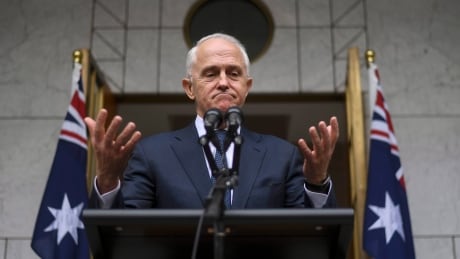 Australian Prime Minister Malcolm Turnbull speaks to the media during a press conference at Parliament House in Canberra, Thursday, Aug. 23, 2018. The beleaguered prime minister warned he will quit Parliament on Friday if his disgruntled party continues to try to oust him, forcing a by-election that could cost the government its single-seat majority or push his successor into immediately calling general elections. APTOPIX Australia Politics