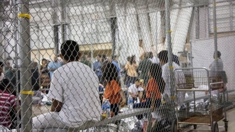 I this June 17, 2018 file photo provided by U.S. Customs and Border Protection, people who've been taken into custody related to cases of illegal entry into the United States, sit in one of the cages at a facility in McAllen, Texas. A complaint filed Thursday, Aug. 23 with the Department of Homeland Security alleges that immigration authorities coerced dozens of parents separated from their children at the border to sign documents they didn't understand. Immigration Separating Families