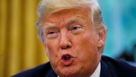 U.S. President Donald Trump, seen in the White House on Tuesday, didn't elaborate on why he was bringing the Clinton accusation to light at this particular time. Trump