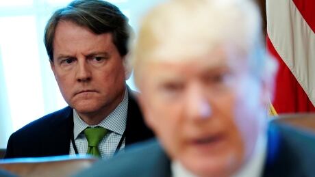 White House Counsel Don McGahn sits behind U.S. President Donald Trump as the president holds a cabinet meeting at the White House on June 21. USA-TRUMP/