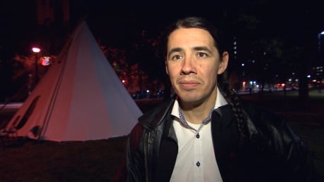 Robert Falcon-Ouellette sleeps in teepee in Central Park in Winnipeg. Robert Falcon-Ouellette
