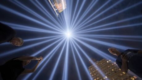 People gather at the "Tribute in Light" in Lower Manhattan, New York, September 9, 2015. The tribute was lit two days ahead of the 14th anniversary of the 9/11 terrorist attacks. USA-WORLDTRADECENTER/