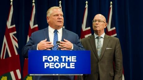 Ontario Premier Doug Ford speaks to reporters with MPP Steve Clark, Minister of Municipal Affairs and Housing, in Toronto, on Monday, September 10, 2018. Toronto Council Cut 20180910