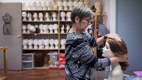 Frances Rae, manager of Eva and Company Wigs, works at the store where a collection of wigs worth more than $350,000 that were intended for cancer patients at B.C. Childrens' Hospital were stolen, in Vancouver, on Wednesday September 12, 2018. Police say at least 150 wigs worth approximately $2,500 each were taken on Friday morning. THE CANADIAN PRESS/Darryl Dyck Cancer Patient Wigs 20180913