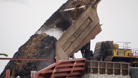 Earlier this month, Teck wrote down the value of its Fort Hills oilsands project by $900 million. Fort Hills mining truck