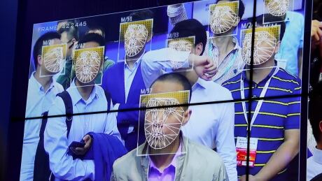 Visitors experience facial recognition technology at Face++ booth during the China Public Security Expo in Shenzhen, China October 30, 2017. Picture taken October 30, 2017. CHINA-FACIALRECOGNITION/