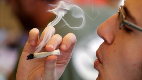 With impending pot legalization, businesses should be thinking about the rules they have in place for drug and alcohol usage, and communicating those to employees, says the Saskatchewan Chamber of Commerce. Pot Taxation A man smokes a marijuana joint