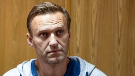 Russian opposition leader Alexei Navalny listens, in a court room in Moscow, Russia, Monday, Aug. 27, 2018. A court in Moscow has sentenced Russian opposition leader Alexei Navalny to a month in jail for an unsanctioned protest rally. Navalny’s arrest outside his home on Saturday came as a surprise since police detained him over a protest rally held in January. Russia Opposition
