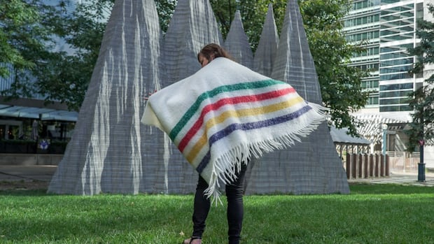 Court OK's Hudson's Bay selling trademarks, like iconic stripes, to Canadian Tire | CBC News