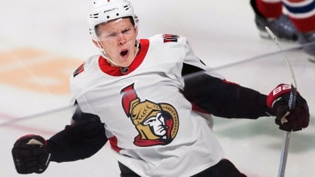 FILE - In this Sept. 22, 2018, file photo, Ottawa Senators' Brady Tkachuk celebrates after scoring against the Montreal Canadiens during the first period of an NHL hockey preseason game, in Montreal. The buzz around the NHL for months has been about smooth-skating Rasmus Dahlin in Buffalo. But other players to watch this season include Ryan Donato in Boston, Brady Tkachuk in Ottawa, Erik Karlsson with his new teammates in San Jose and Ilya Kovalchuk returning to the NHL in Los Angeles. (Graham Hughes/The Canadian Press via AP, File) Players to Watch Hockey