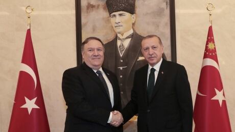 Turkey's President Recep Tayyip Erdogan, right, and U.S. Secretary of State Mike Pompeo shake hands before a meeting at the Esenboga Airport in Ankara on Wednesday, Oct. 17, 2018. Pro-government newspaper Yeni Safak on Wednesday said it had obtained audio recordings of the alleged killing of Saudi writer Jamal Khashoggi inside the Saudi Arabia Consulate in Istanbul on Oct. 2. Turkey Saudi Arabia Missing Writer