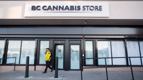 A security guard walks outside British Columbia's first legal B.C. cannabis store in Kamloops, B.C. Tuesday, Oct. 16, 2018. Canada will legalize cannabis nation wide on Wednesday, Oct. 17 2018 allowing stores across the country to open and legally sell cannabis and cannabis products. Cannabis Legalization 20181016 TOPIX