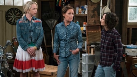This image released by ABC shows Lecy Goranson, from left, Laurie Metcalf and Sara Gilbert in a scene from "The Connors," airing Tuesdays on ABC. (Eric McCandless/ABC via AP) TV Review-The Conners