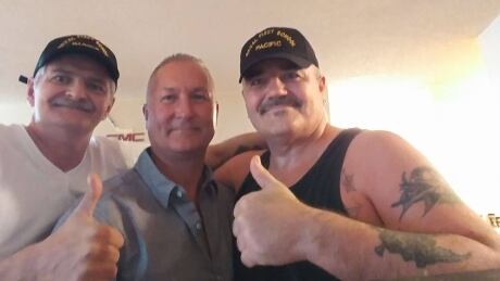 Chris Langevin (left) and his brother John (right), met with their half-brother Kevin Hall (centre) last summer. They had lived on the same street in Toronto when they were young.
Chris Langevin, Kevin Hall and John Langevin