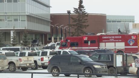 A fire truck and other emergency vehicles remain on the scene Thursday outside the Strathcona County
