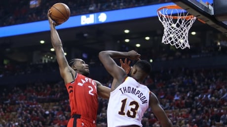 Toronto's Kawhi Leonard dunks the ball on Cleveland's Tristan Thompson during his first game as a Raptor. leonard-kawhi-110918