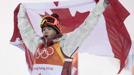 Canadian Mikael Kingsbury, seen celebrating his gold medal in moguls at the 2018 Olympics in Pyeongchang, has already rewritten the record books and has no plans to slow down now that the new quadrennial is here. kingsbury-mikael-021218-620