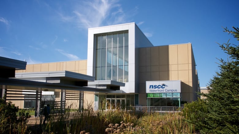 An institutional building with a sign that says NSCC Waterfront Campus