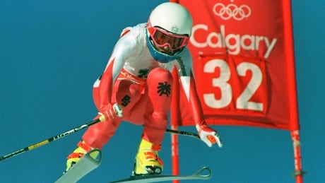 Austrian skier Anita Wachter flies past a gate during the women's downhill of the combined event at the Winter Olympic Games, 20 February 1988 in Nakiska, near Calgary, on her way to third place. The next day, Anita Wachter finished second in the combined slalom to win the gold medal overall. AFP PHOTO/PHILIPPE BOUCHON (Photo credit should read PHILIPPE BOUCHON/AFP/Getty Images) calgary-1988-skier