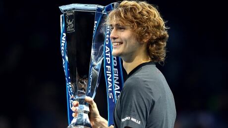 Alexander Zverev of Germany celebrates his 6-4, 6-3 victory over top-ranked Novak Djokovic in the championship match at the ATP finals in London on Sunday. zverev-alex-181118-1180