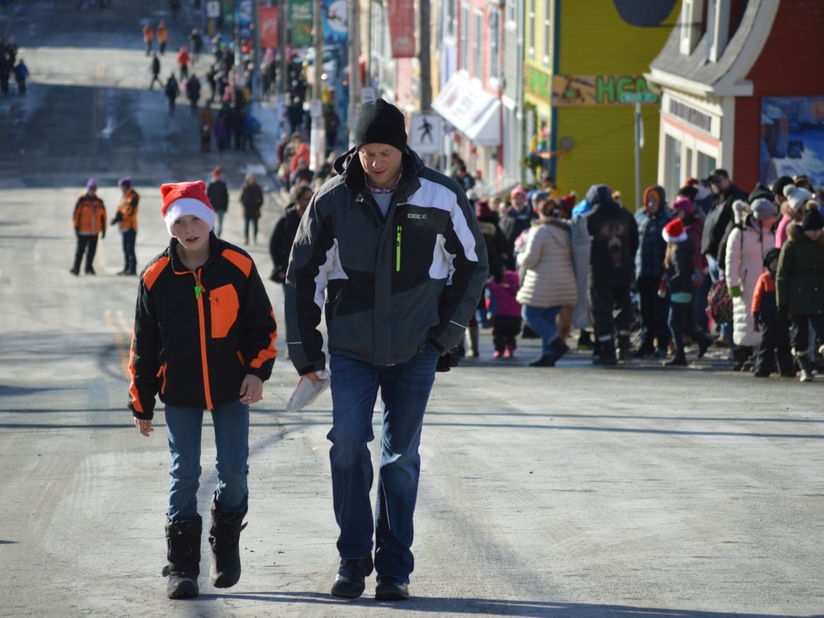 Christmas Parade 2022 St Johns Mi St. John's Christmas Parade Draws Thousands Of Spectators — And One  Marriage Proposal | Cbc News
