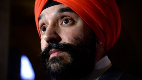 Minister of Innovation, Science and Economic Development Navdeep Bains listens to a question during a press conference on General Motors' decision regarding the future of its automotive plant in Oshawa, on Parliament Hill in Ottawa on Monday, Nov. 26, 2018. GM Canada Federal 20181126