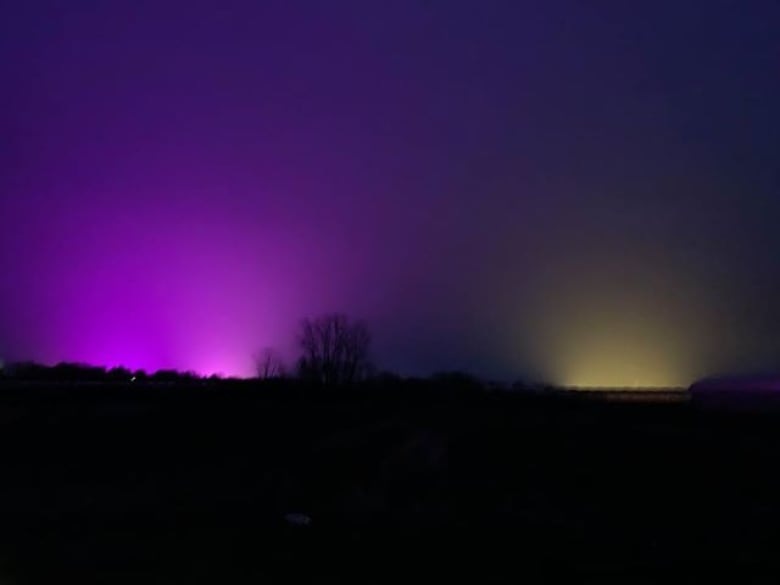 Nova Scotia: Bright pink sunset fills the evening sky