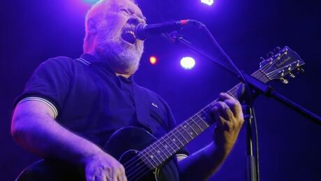 FILE - In this May 19, 2018, file photo, Pete Shelley, of the British punk band Buzzcocks, performs at Plaza Condesa in the 6th edition of the Marvin Festival in Mexico City. The punk band has confirmed "with great sadness", Thursday, Dec. 6, 2018, the death of the band's co-founder, Pete Shelley, whom it called "one of the U.K.'s most influential and prolific songwriters." He was 63. Shelley founded the band with Howard Devoto after they met at what is now the University of Bolton and the band debuted in 1976 in Manchester, opening for the Sex Pistols. Obit-Peter Shelley