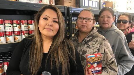 Staff at the Tsuut'ina food bank are working hard to make the holiday season a little better for nation members. From left to right Crystal Starlight, Toni Jacobs, Cynthia Jacobs, and Sharon Deschamps-Otter Food Bank 1