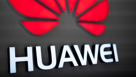 The Huawei logo is displayed at a store in Beijing on December 6, 2018. - The chief financial officer of China's global telecommunications giant Huawei has been arrested in Canada and faces extradition to the United States, officials said, triggering a strong protest by Beijing, which called for her immediate release. AFP_1BD7CC