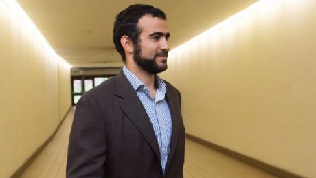 Omar Khadr leaves court after a judge ruled to relax bail conditions in Edmonton on Friday, Sept. 18, 2015. Former Guantanamo Bay detainee Omar Khadr wants to change some of the conditions of his bail, asking for a Canadian passport to travel to Saudi Arabia and requesting phone contact with his controversial sister. Khadr Bail 20181210