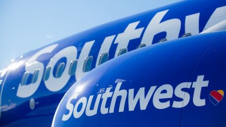 Southwest introduced its new, tri-coloured heart logo in 2014. The logo appears on the airline's planes, app, website and "airport experience." southwest logo