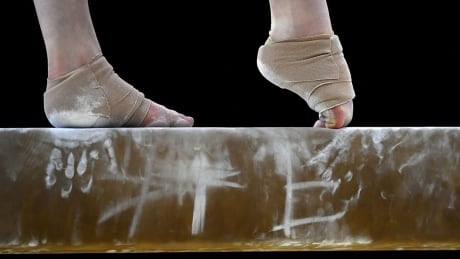 LIVERPOOL, ENGLAND - MARCH 09: A detailed view of feet on the beam during The Women's Junior All-Around Subdivision 1 Round during the Gymnastics British Championships at Echo Arena on March 9, 2018 in Liverpool, England. (Photo by Laurence Griffiths/Getty Images) gymnastics-feet-1180
