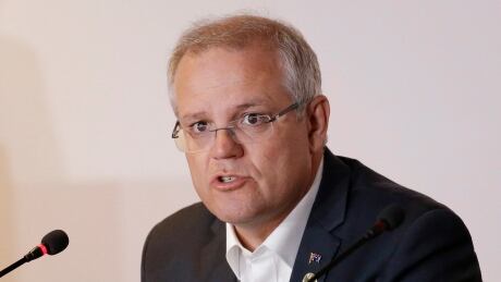 FILE - In this Nov. 18, 2018, file photo, Australian Prime Minister Scott Morrison speaks during the APEC 2018 meetings in Port Moresby, Papua New Guinea. Australia has decided to formally recognize west Jerusalem as Israel’s capital, but won’t move its embassy until there’s a peace settlement between Israel and Palestinians, Prime Minister Morrison announced Saturday. (AP Photo/Aaron Favila, File) Australia Israel Jerusalem