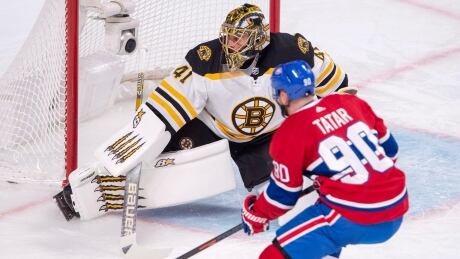 Boston Bruins goaltender Jaroslav Halak (41) stops Montreal Canadiens left wing Tomas Tatar (90) during the first period Monday night. bruins-canadiens