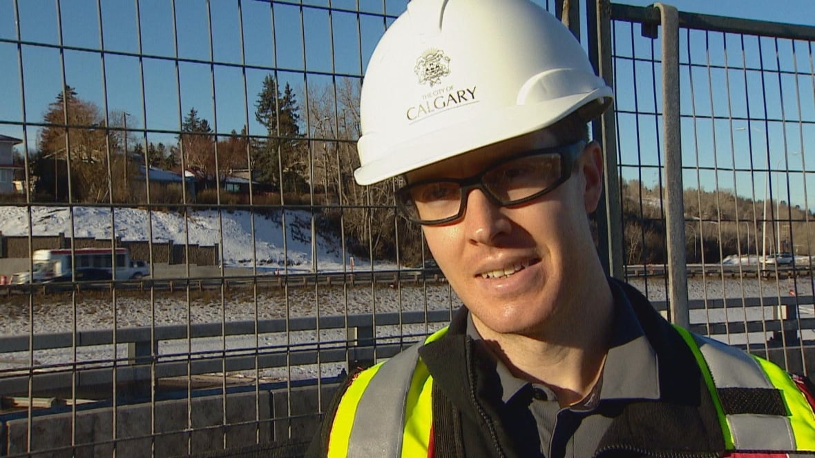 A man in a hard hat.