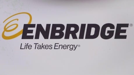 The Enbridge logo is shown at the company's annual meeting in Calgary on May 9, 2018. Enbridge is getting a $14.7-million refund on fees it paid Canada's federal energy regulator for a pipeline it won't get to build. Pipeline Refund 20181227
