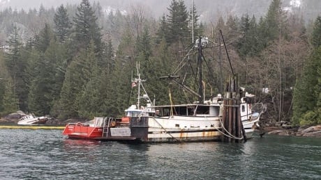 A Coast Guard vessel beside the ex-fishing vessel La Rata Bastarda, one of the five vessels that the Coast Guard removed from the marine environment Thursday. Darrell Bay boats